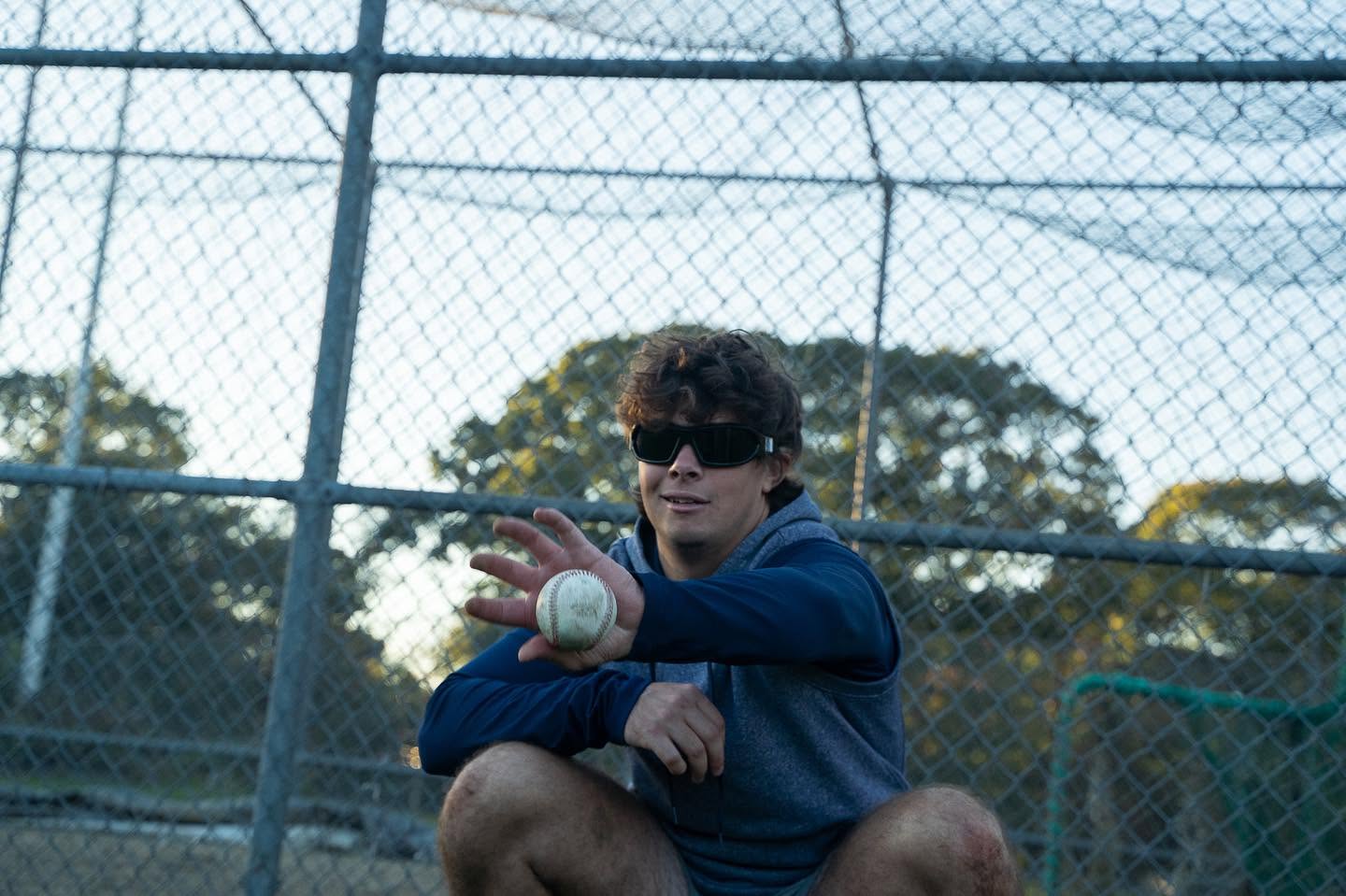 Baseball athlete tracking an incoming baseball